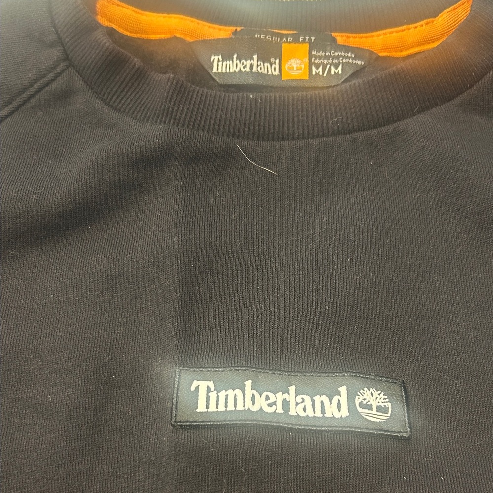 Timberland Black Crewneck Sweater with Orange Accent